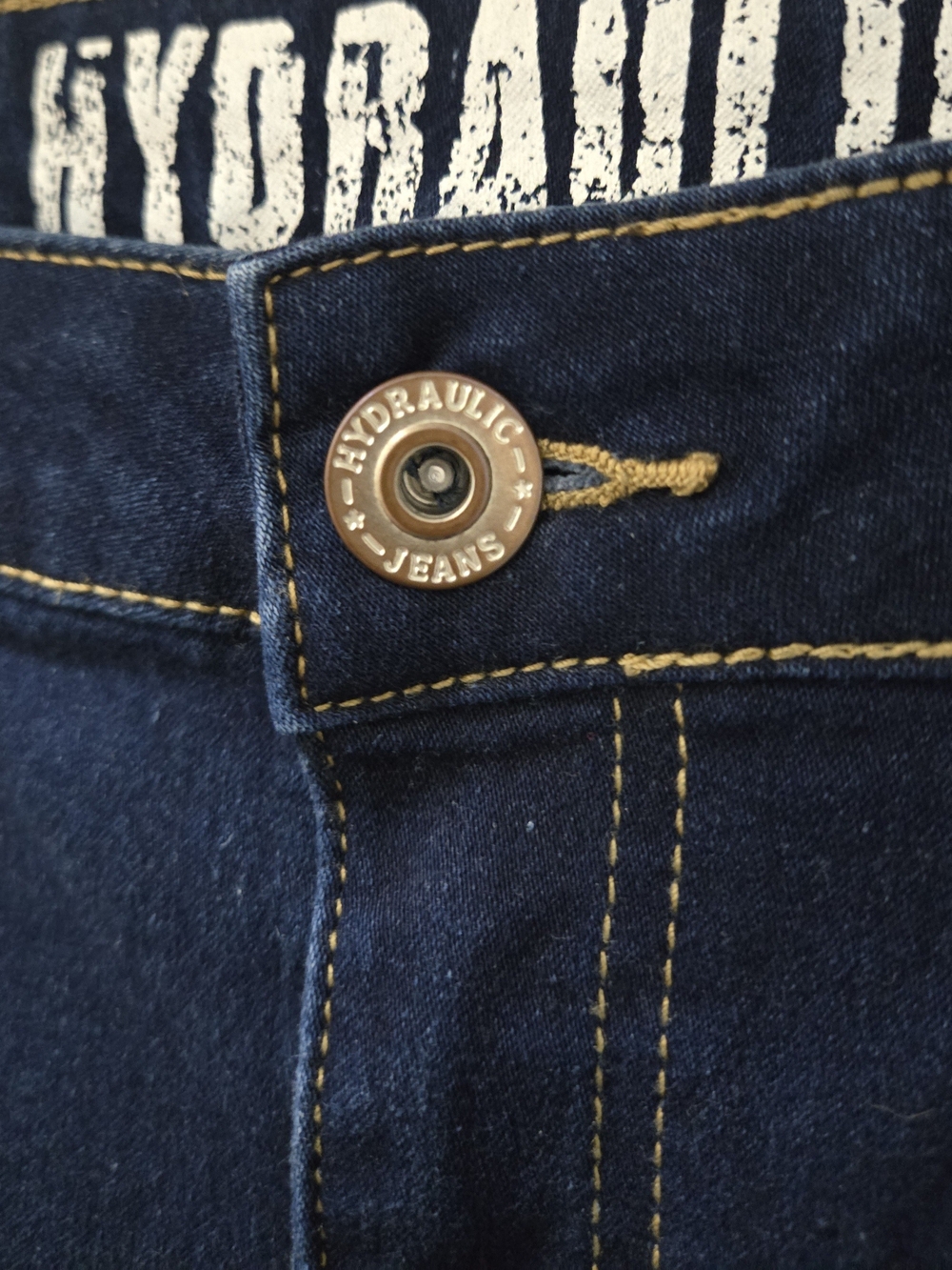 Hydraulic Low-Rise Skinny Jeans in Dark Blue with Yellow Stitching